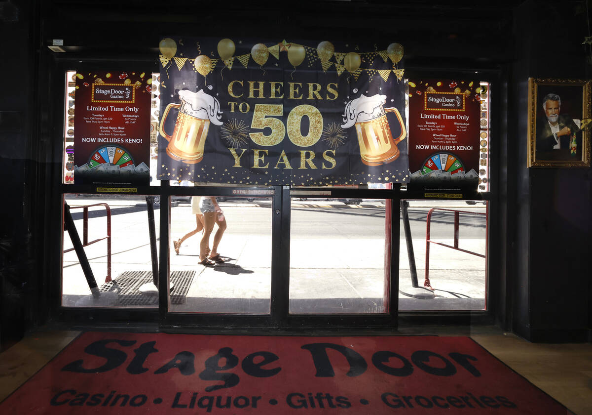 Pedestrians walk past Stage Door Casino on Thursday, May 29, 2026, in Las Vegas. Stage Door Cas ...