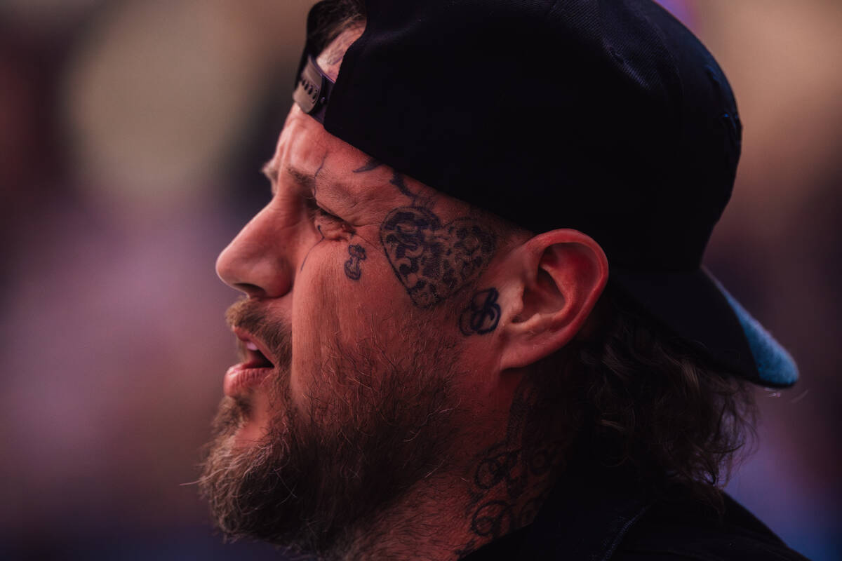 Jelly Roll reacts to the pain from putting Pat McAfee through a table on day one of WrestleMani ...