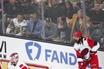 Athletics owner John Fisher, center left in grey, watches the game alongside casino owner Derek ...