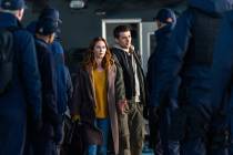This image released by Universal Pictures shows Emily Blunt, left, and Josh O'Connor in a ...
