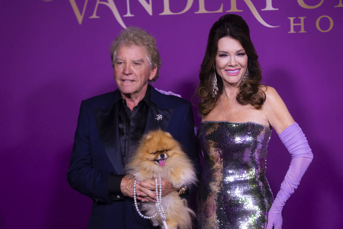 Lisa Vanderpump poses with husband Ken Todd and pomeranian Puffy on the red carpet for the gran ...