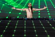 Steve Aoki performs on stage in Toshiba Plaza during the pre-game festivities before Game 6 of ...