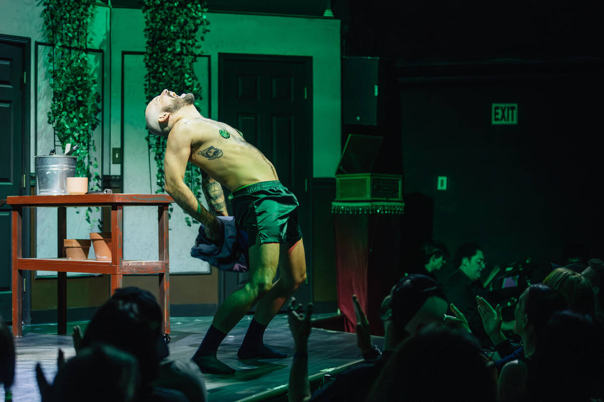 Simone Skold performs as Mr. Grass during a showing of ClueX, a burlesque parody, at Notoriety ...