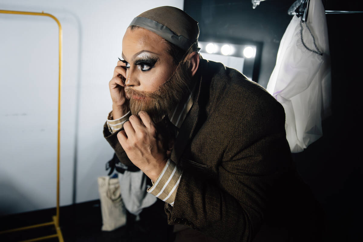 Jaymes Mansfield gets into costume before a showing of ClueX, a burlesque parody, at Notoriety ...