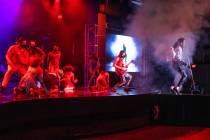 Jalles Franca as Michael Jackson is bathed in smoke along with dancers and a guitarist during t ...