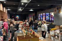 Hogs & Heifers COO Michelle Sandler holds an impromptu meeting with staff at the pop-up Hogs & ...