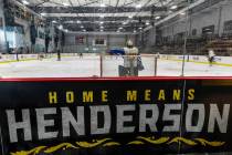 Hockey players work the ice on a rink in the America First Center along Water Street on Friday, ...