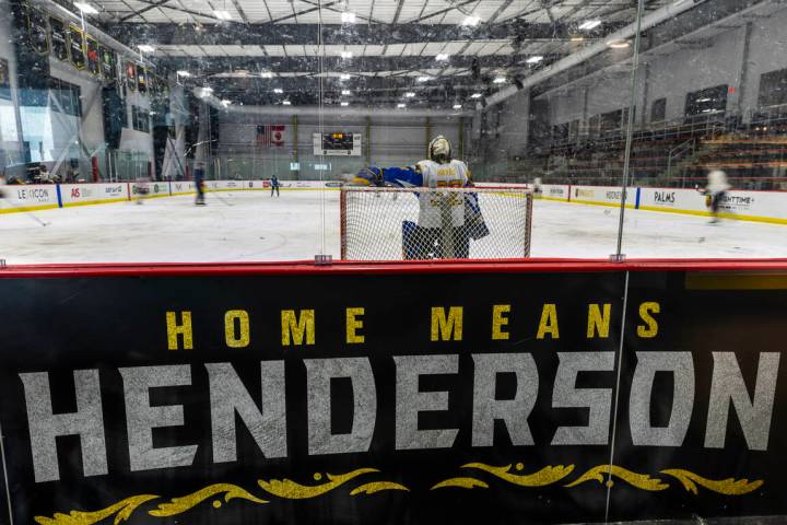 Hockey players work the ice on a rink in the America First Center along Water Street on Friday, ...