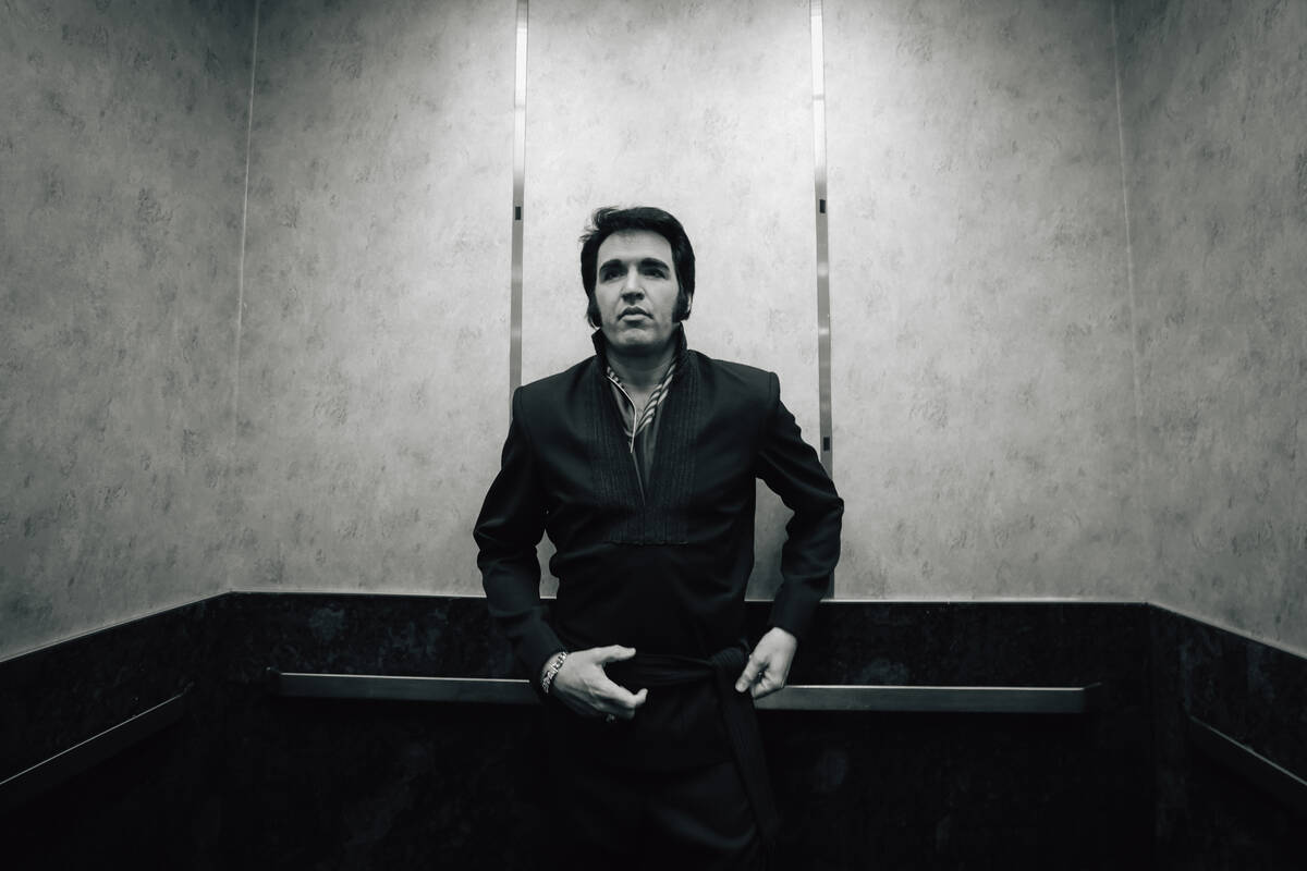 Travis Powell, an Elvis tribute artist, goes up the same elevator that Elvis Presley used for h ...