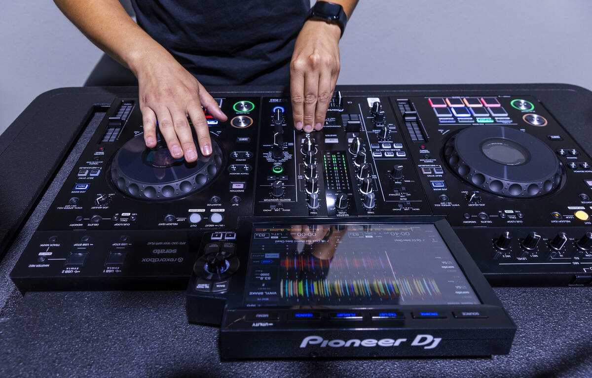 DJ Krush sets ups for the next class as CTRL Room offers a 90-minute DJ experience with instruc ...