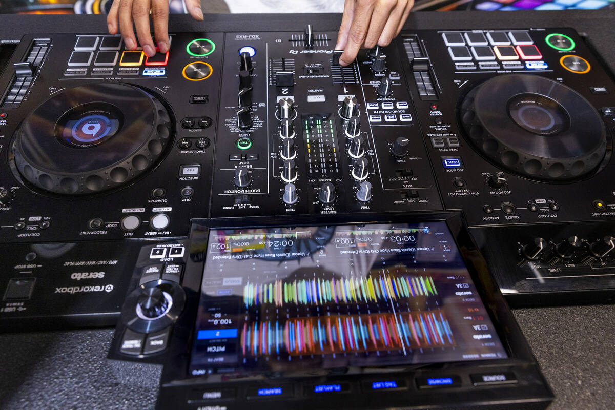 Student Osoflako works the board in class as CTRL Room offers a 90-minute DJ experience with in ...