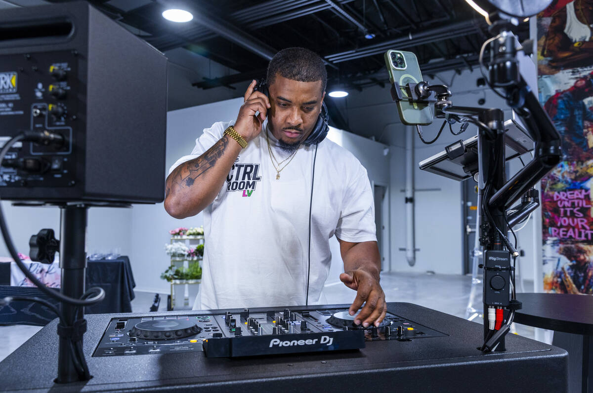 Chris Clark works the board at CTRL Room which offers a 90-minute DJ experience with instructio ...