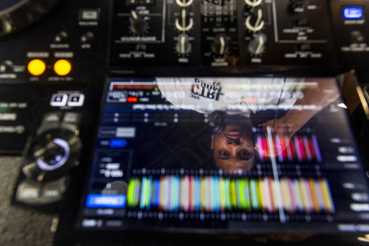 Chris Clark works the board at CTRL Room which offers a 90-minute DJ experience with instructio ...