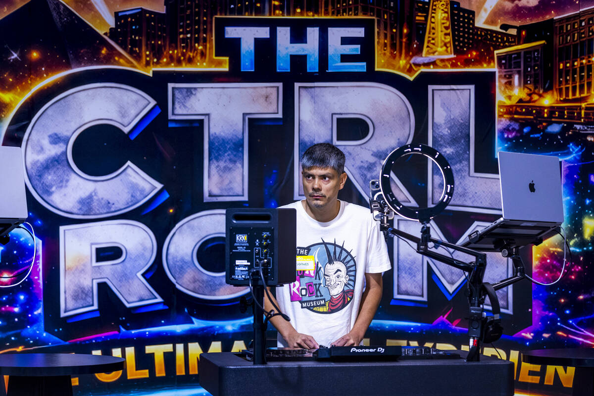 Student Osoflako works the board in class as CTRL Room offers a 90-minute DJ experience with in ...