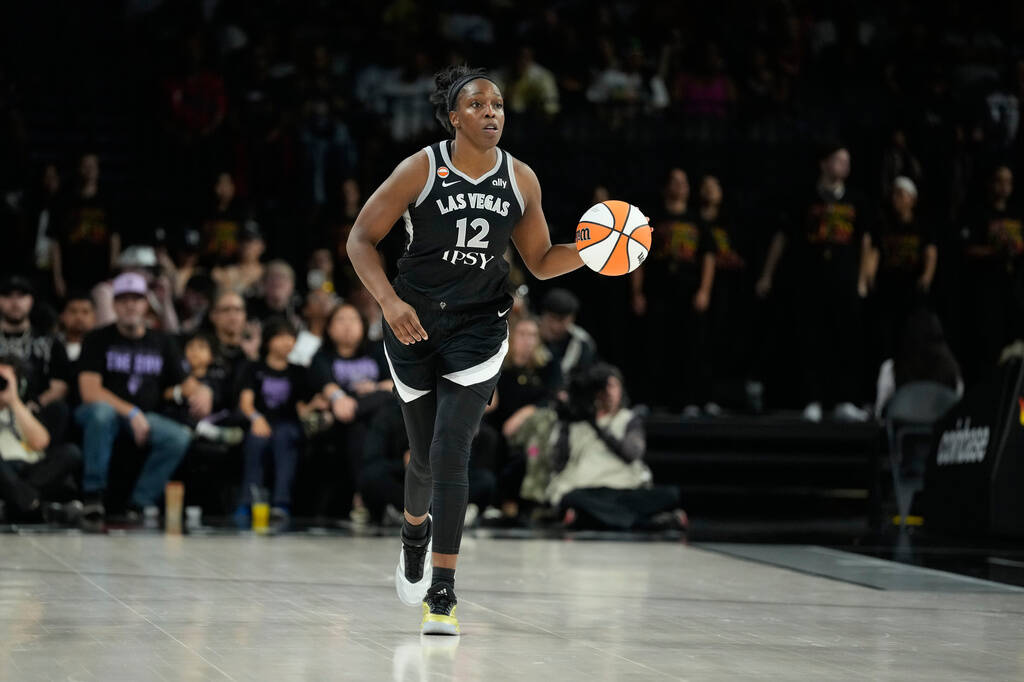 Las Vegas Aces guard Chelsea Gray (12) plays against the Golden State Valkyries in a WNBA baske ...