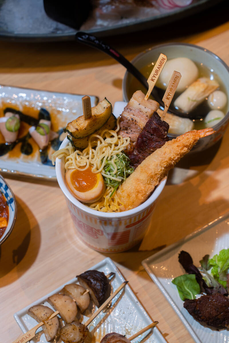 Ramen street cup and yakitori skewers from Super Kyuramen, open as of summer 2026 in Chinatown ...
