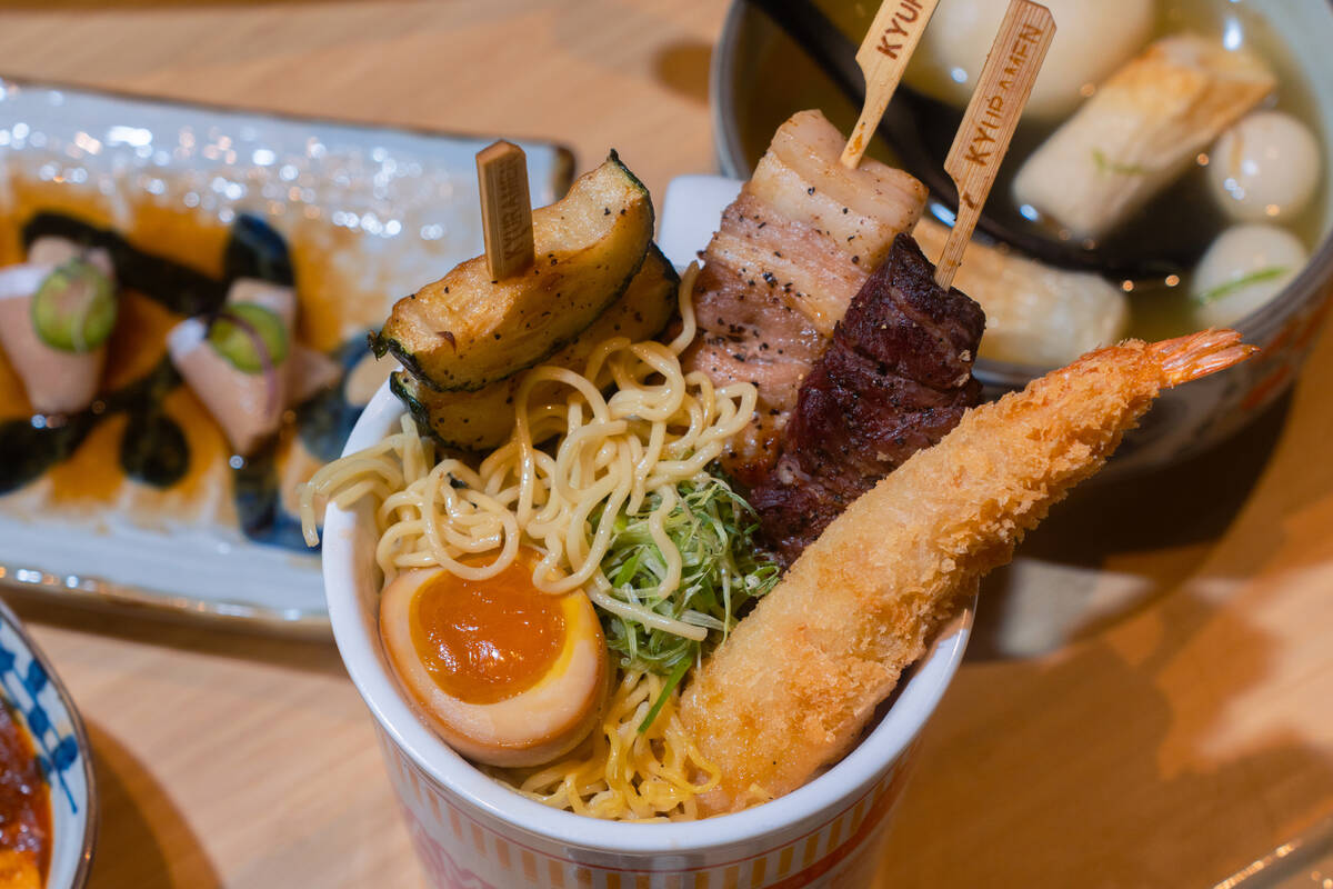 Ramen street cup and yakitori skewers from Super Kyuramen, open as of summer 2026 in Chinatown ...
