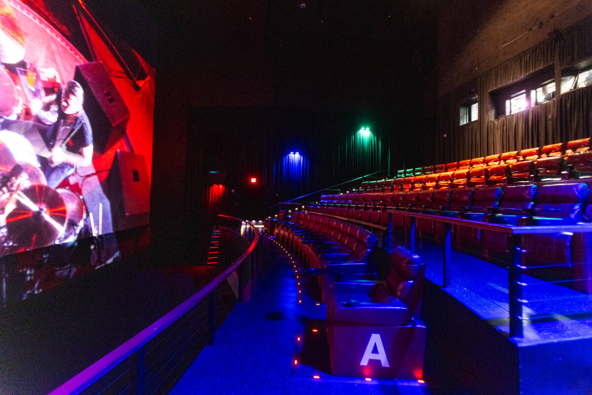 Light from an IMAX projector, shines into the IMAX theater at Brenden Theaters on Wednesday, Ju ...