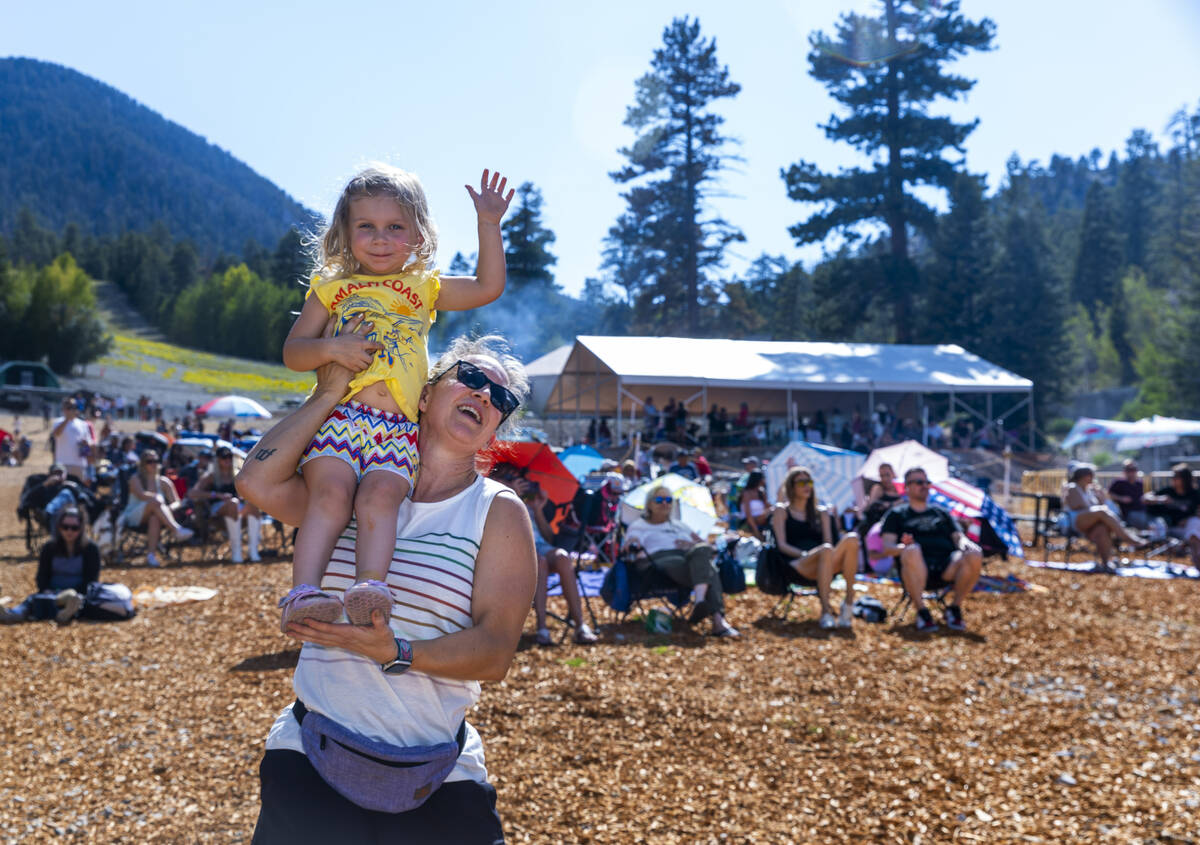 Danica Brown and her daughter Reese, 3, dance to the music of the Parametrics during the Music ...