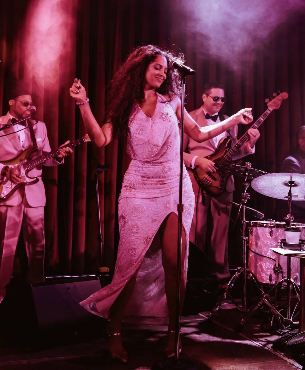 Vocalist Chezzarie of the Diamonds is in the powerhouse lineup at The Pinky Ring at Bellagio. ( ...
