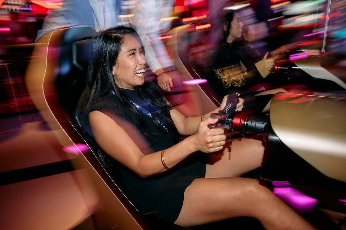 The simulators at the F1 Arcade allows users to "race" the Las Vegas Grand Prix track, among ot ...
