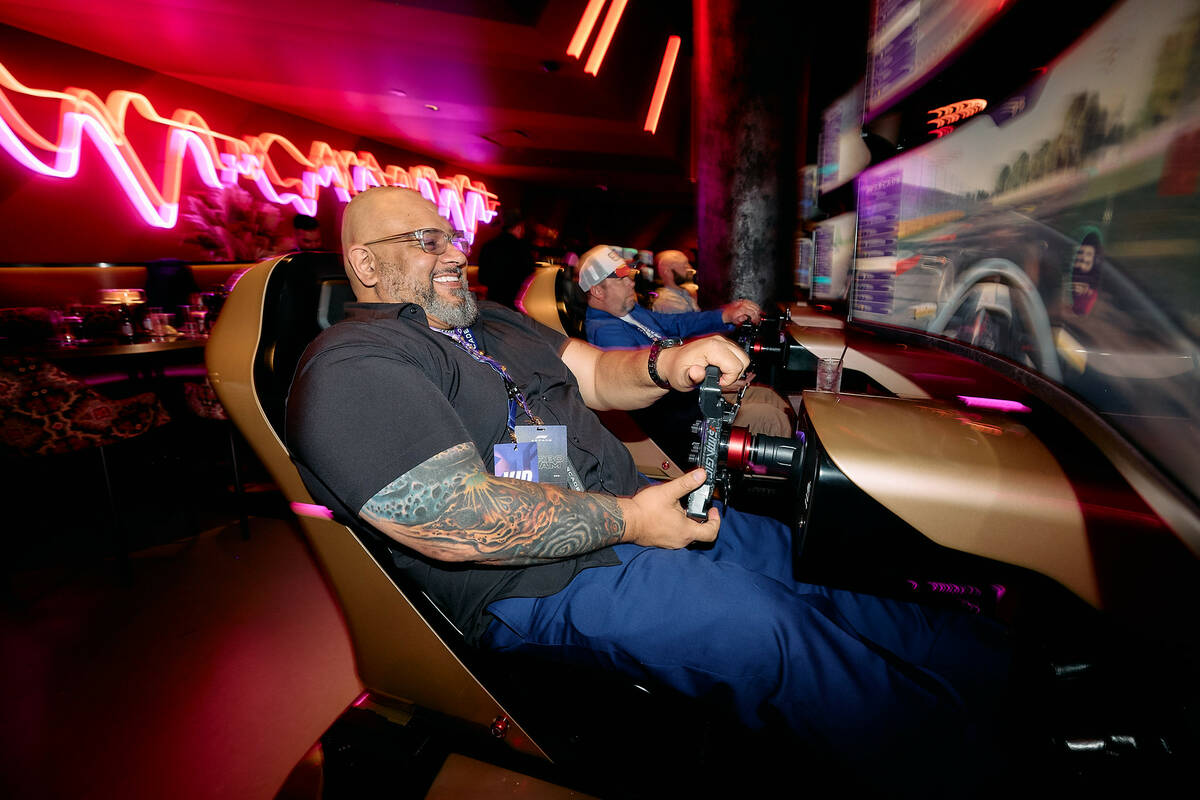 The simulators at the F1 Arcade allows users to "race" the Las Vegas Grand Prix track, among ot ...