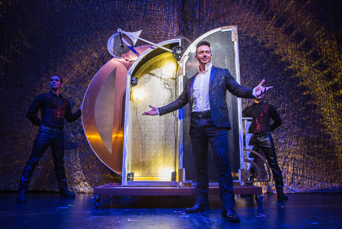 Illusionist David Goldrake, right, rehearses for his new show Imaginarium on Thursday, June 22, ...