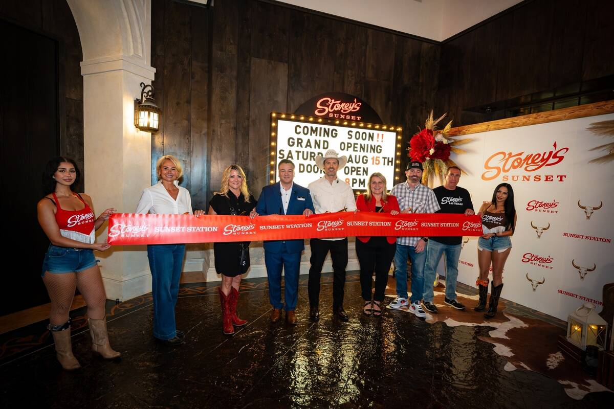 Dignitaries are shown at Saturday's grand opening of Stoney's Sunset at Sunset Station on Satur ...