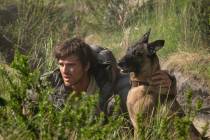 This image released by 20th Century Studios shows Jacob Elordi in a scene from "The Dog St ...