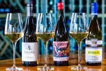 A white flight of wine at Hung Up on Wine, a new wine bar opened by Hung Nguyen, longtime forme ...