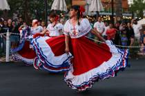 Performers representing Costa Rica dance in the inaugural Latin Heritage Parade on Tuesday, Sep ...