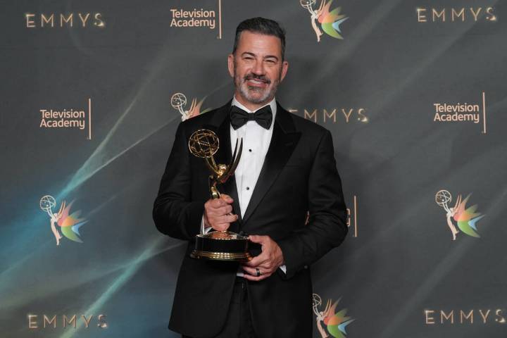 Jimmy Kimmel poses with the award for outstanding host for a game show for "Who Wants to B ...