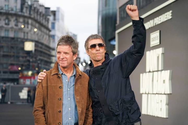Noel Gallagher, left, and Liam Gallagher pose for photographers at the photo call for the film ...