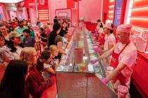 People order ice cream in the cone course during an early walkthrough of the Museum of Ice Crea ...
