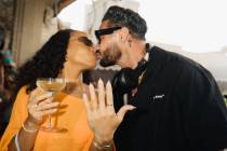 Nikki Hall shows off her ring as she and Pauly D kiss after the headlining DJ popped the questi ...