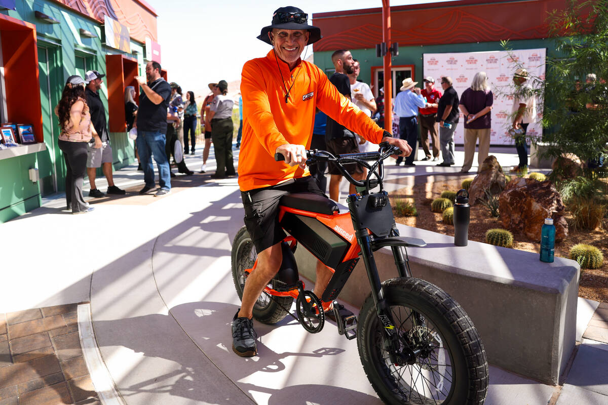 Owner of Canyon Riders, Brian Burns, smiles while on an e-bike at the Travel Nevada Adventure C ...