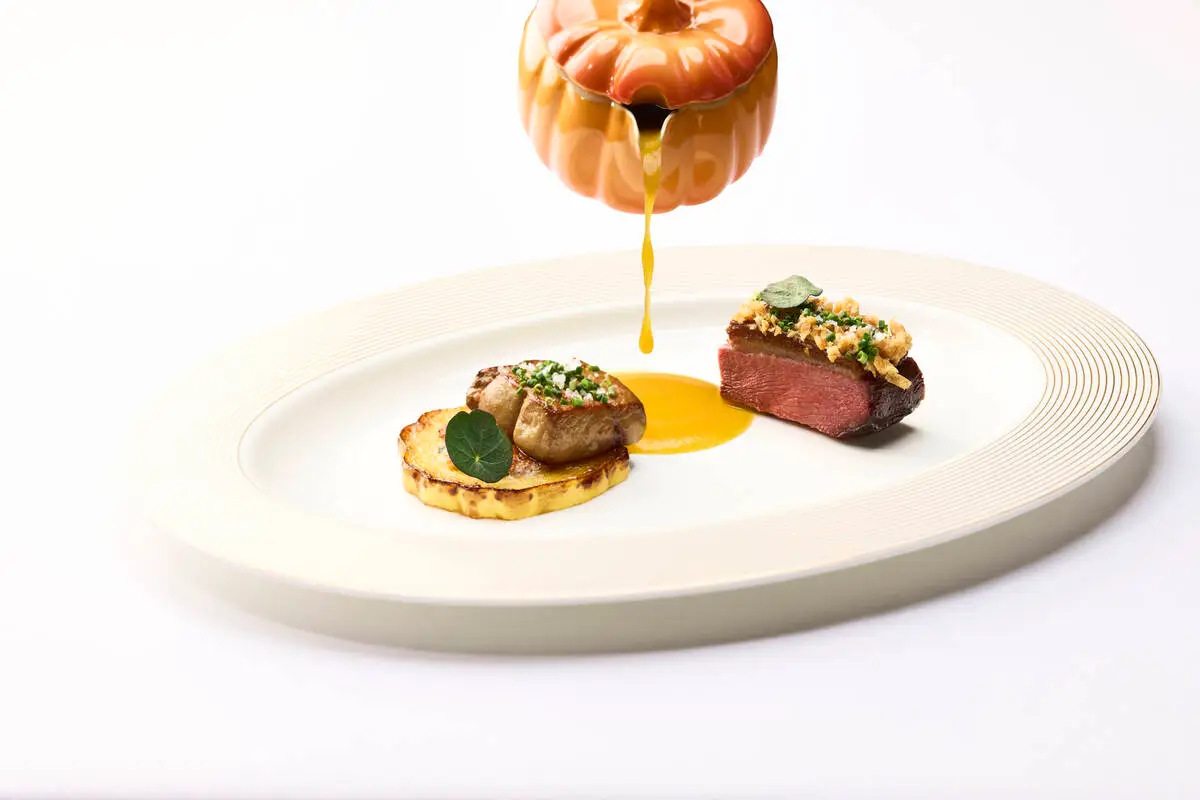 A trio of duck confit-stuffed delicata squash, slow roasted duck breast and seared Hudson Valle ...