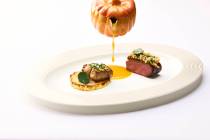 A trio of duck confit-stuffed delicata squash, slow roasted duck breast and seared Hudson Valle ...