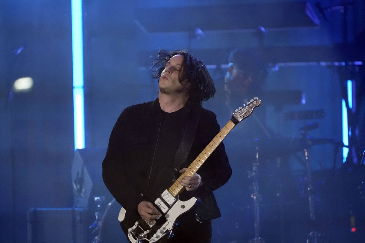 Jack White performs during a concert celebrating the historic reopening of a an 18-story struct ...