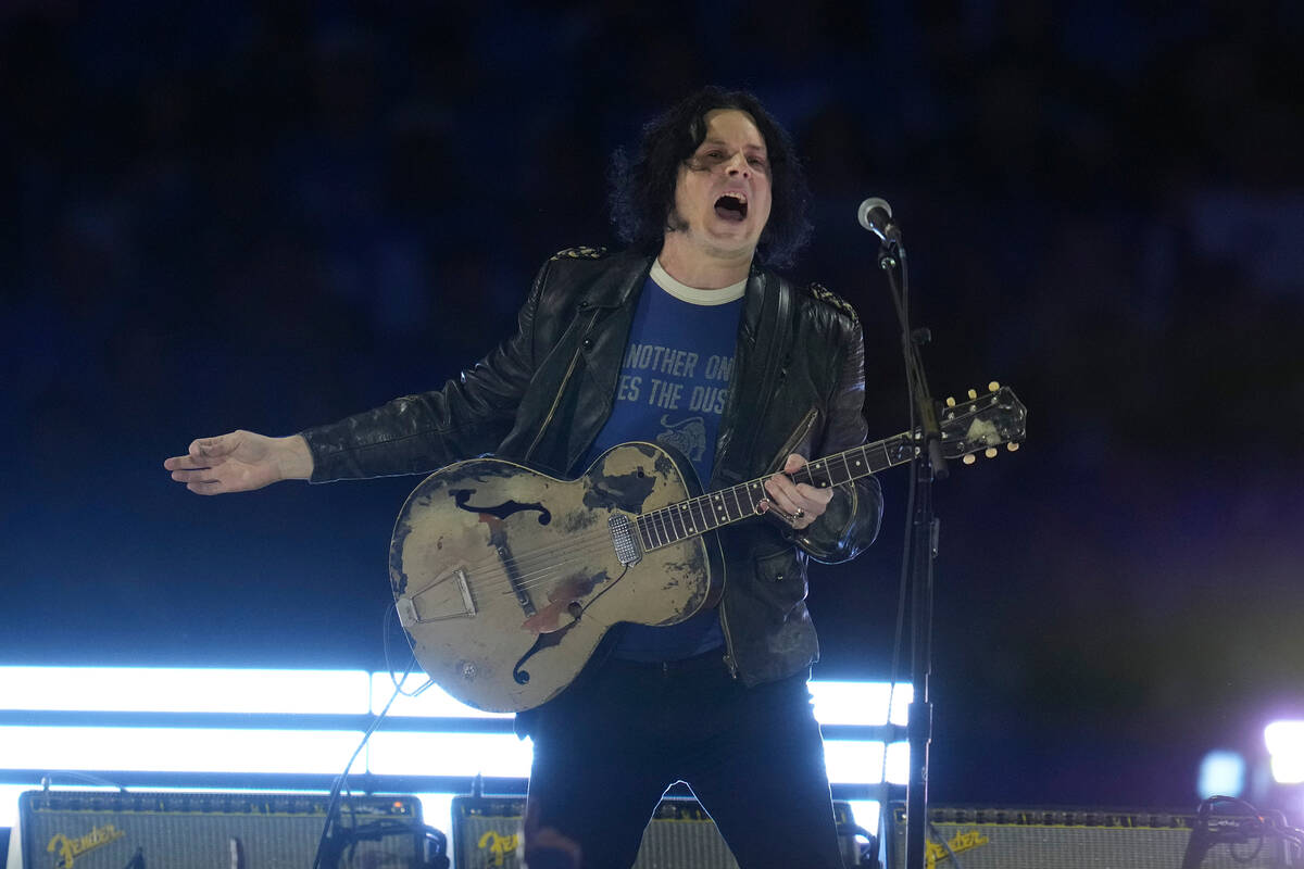 Musician Jack White performs during half time of an NFL football game between the Green Bay Pac ...