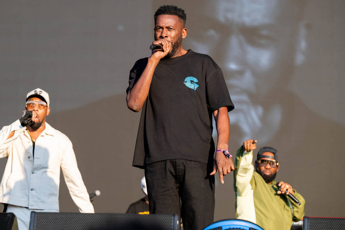 GZA, backed by RZA, left, and Raekwon, performs with Wu-Tang Clan last month at the Shaky Knees ...
