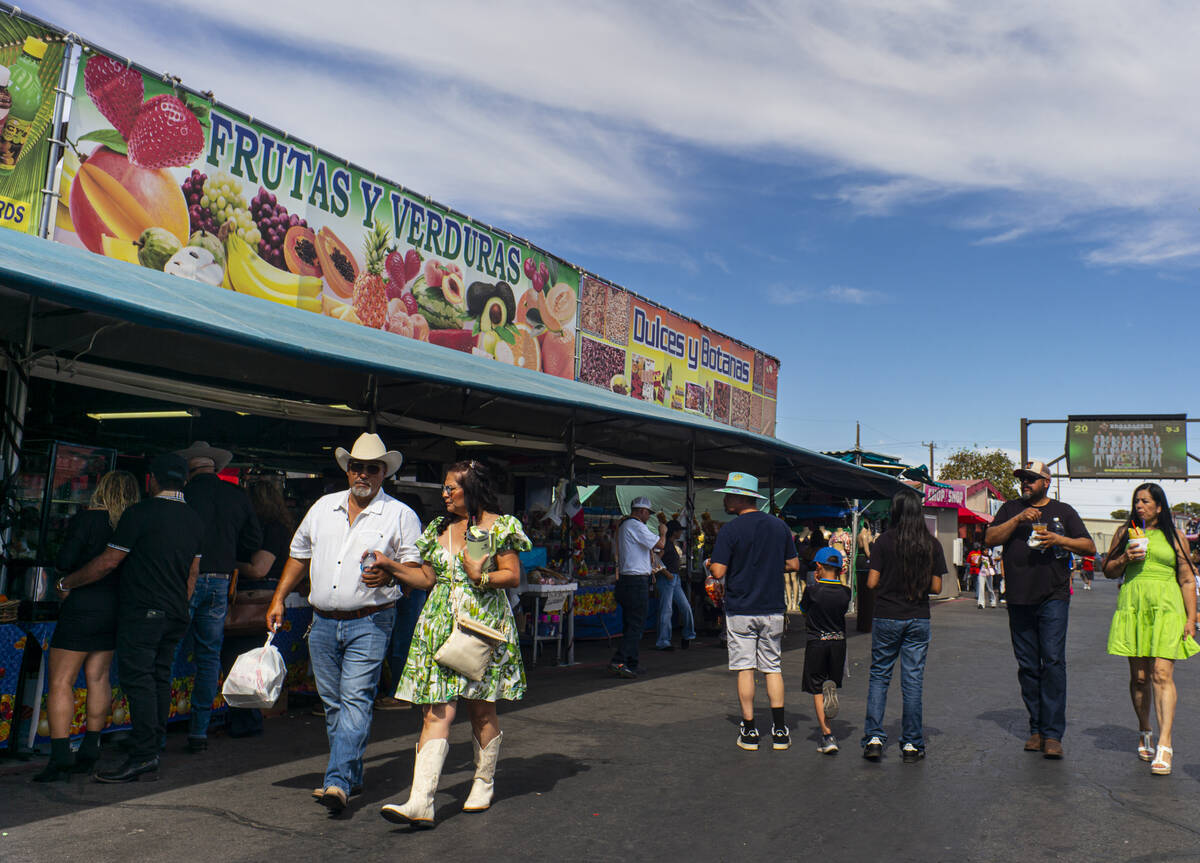 People walk around and explore the Broadacres Marketplace on Sunday, Sept. 20, 2026, in North L ...