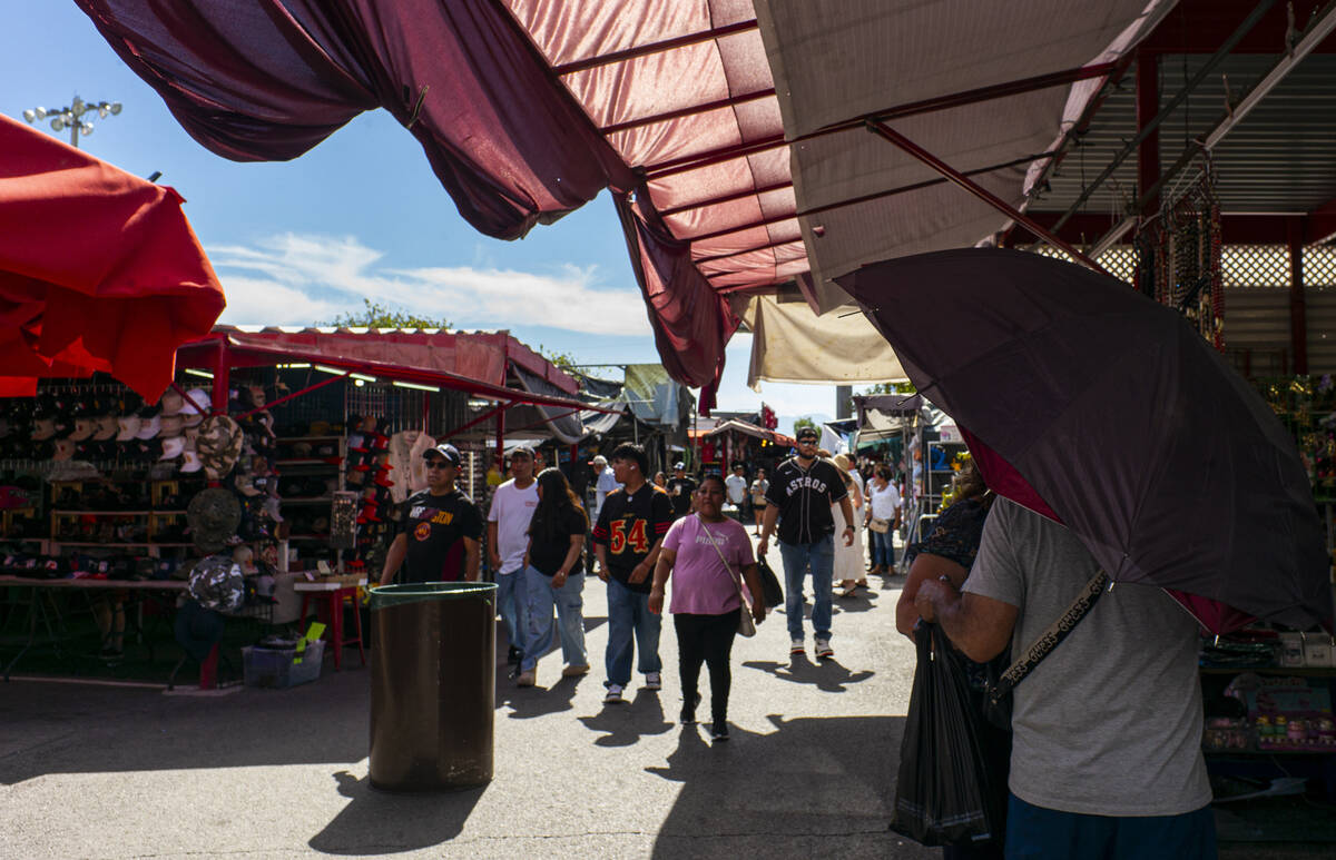 People walk around and look at vendors at the Broadacres Marketplace on Sunday, Sept. 20, 2026, ...