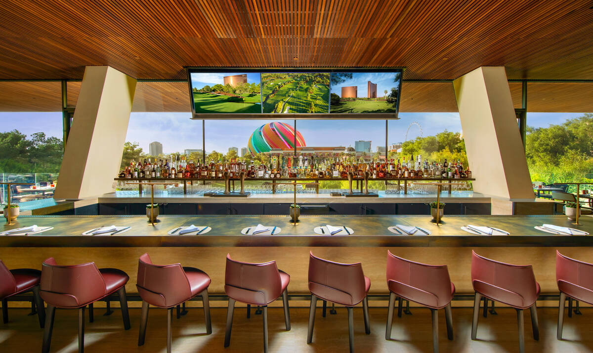 The bar of Wynn's Cliff House Grill, the new restaurant overlooking the 18th green at Wynn Golf ...