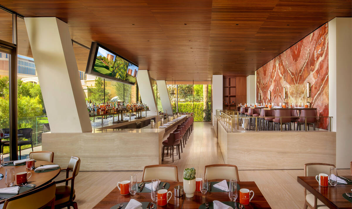 The main dining room of Wynn's Cliff House Grill, the new restaurant overlooking the 18th green ...