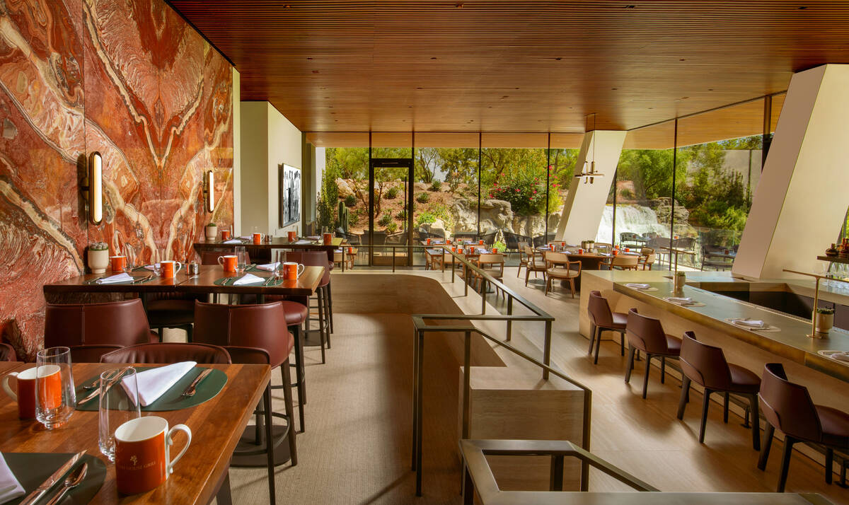 The main dining room of Wynn's Cliff House Grill, the new restaurant overlooking the 18th green ...