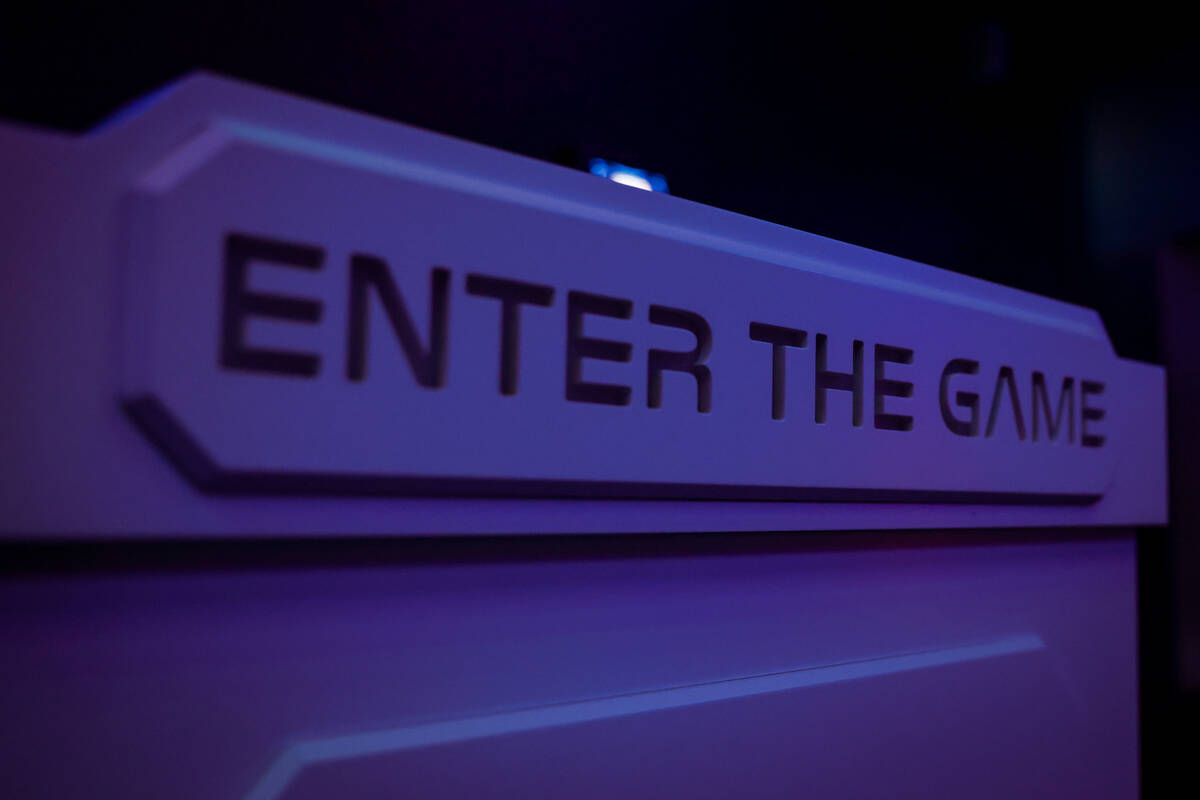 “Enter the game” displayed at the help desk in the game hallway in Activation Gam ...