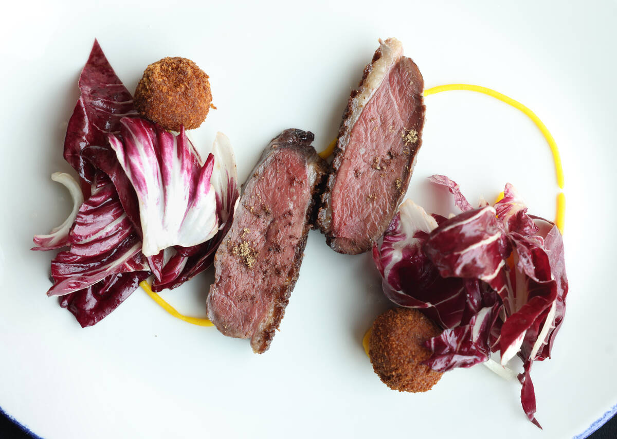La Belle Farms duck a l'orange with orange flower water and arancini rillettes from Bar Boheme ...