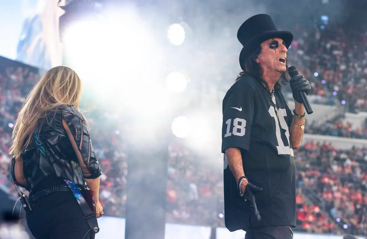 Alice Cooper performs during the halftime show at the Raiders NFL game at Allegiant Stadium on ...