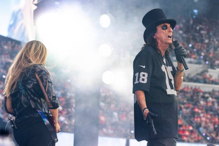 Alice Cooper performs during the halftime show at the Raiders NFL game at Allegiant Stadium on ...